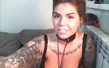 Tattooed babe with huge boobs